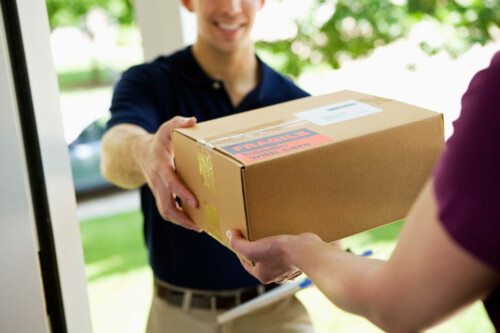 Delivery: Giving Package To Home Owner